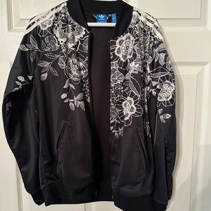 Beautiful black and off white Adidas jacket